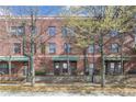 Brick townhome building with well-maintained landscaping and multiple entrances at 791 Wylie Se St # 1111, Atlanta, GA 30316