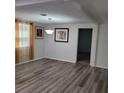 Bright dining area with new floors, modern lighting, and natural light at 3785 Somerset Sw Dr, Marietta, GA 30064