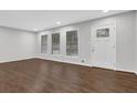 Bright living room featuring hardwood floors, fresh paint, and plenty of natural light at 1531 Piedmont Ne Rd, Marietta, GA 30066