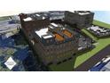 An aerial view showing the rear of the buildings including a terrace with furniture and a parking garage at 120 N Main St # 2A, Alpharetta, GA 30009