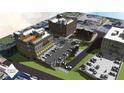 A vibrant aerial view of the mixed-use development showcasing the building exteriors and parking area at 120 N Main St # 2A, Alpharetta, GA 30009