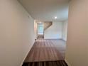 Comfortable living space with carpeted floors, neutral walls, and natural light at 7748 Sudbury Cir, Covington, GA 30014