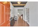 Welcoming foyer featuring hardwood floors and stylish decor at 5372 Fountain Head Ln, Auburn, GA 30011