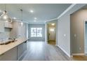 Bright living space with modern finishes and an open layout, connecting to the entry at 3871 Shelleydale Dr, Powder Springs, GA 30127