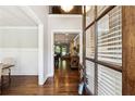 Inviting foyer with hardwood floors, views into the living spaces, and natural light at 95 Nesbit Reserve Ct, Alpharetta, GA 30022