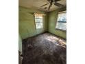 An aging bedroom awaits transformation, offering a blank canvas for renovation and personalization at 5168 Ellen St, Forest Park, GA 30297