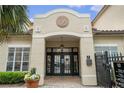 Property entrance showcasing double doors, transom windows, and security access at 955 Juniper St # 3026, Atlanta, GA 30309
