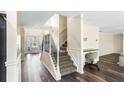 Open staircase with desk area and detailed trim at 1318 Avington Glen Dr, Lawrenceville, GA 30045