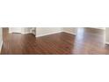 Spacious living room featuring sleek hardwood floors and plenty of natural light at 3459 Village Park Sw Ln, Atlanta, GA 30331