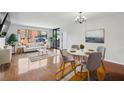 Bright, open living room with large windows and modern decor at 3481 Lakeside Ne Dr # 907, Atlanta, GA 30326
