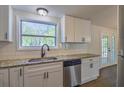 Modern kitchen featuring granite countertops, stainless steel appliances, and white subway tile at 8304 Ephesus Church Rd, Villa Rica, GA 30180