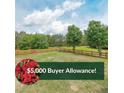 Large fenced backyard offers ample space for recreation and relaxation at 31 Vine Creek Ln, Acworth, GA 30101