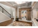 Elegant room with decorative rug, and coffered ceilings, seamlessly blending style and comfort at 336 Elaina Cir, Locust Grove, GA 30248