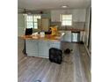 Kitchen featuring an island with butcher block countertop and stainless steel appliances at 865 Cherrydale Ln, Woodstock, GA 30189