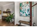 Inviting foyer with hardwood floors, stylish decor, and a glimpse into the home's elegant design at 111 Brighton Blvd, Woodstock, GA 30188