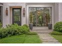 Charming front entrance with a well manicured lawn and stone path leading up to the front door at 1016 Wildwood Ne Rd, Atlanta, GA 30306