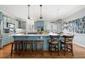 Beautiful kitchen featuring blue cabinets, a large island, stainless steel appliances, and plenty of natural light at 2964 Anderson Se Cir, Smyrna, GA 30080