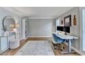 Bright office with hardwood floors, stylish wallpaper, ample natural light, and modern decor at 3045 Hartridge Dr, Johns Creek, GA 30022