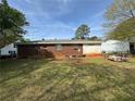 Expansive backyard showcasing the property's outdoor space and potential for recreation or future improvements at 2835 Petersburg Ct, Decatur, GA 30034