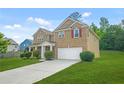 Attractive two-story brick home with well-maintained landscaping at 6533 Waterford Sw St, Atlanta, GA 30331