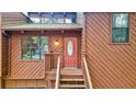 Close-up of the front door and entryway with unique architectural details at 1150 Autumn Ridge Dr, Marietta, GA 30066