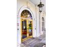 Mayfair Residences grand entrance with gold doors and tile flooring at 195 14Th Ne St # 1507, Atlanta, GA 30309