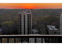 City views from this high-rise apartment during a vibrant sunset at 195 14Th Ne St # 1507, Atlanta, GA 30309