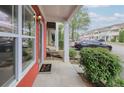 Close-up view of a welcoming front entrance with a 'Welcome' doormat and well-kept shrubbery at 1797 Brookside Lay Cir, Norcross, GA 30093