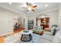 Bright living room with hardwood floors, archways, and comfortable seating arrangements, ideal for relaxation at 1326 Mcpherson Ave., Atlanta, GA 30316