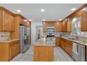 Spacious kitchen boasts granite countertops, stainless steel appliances, and ample cabinet space at 4366 Karls Gate Dr, Marietta, GA 30068