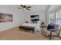 Serene bedroom with a bay window, ceiling fan, and neutral color palette at 4366 Karls Gate Dr, Marietta, GA 30068