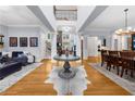 Spacious foyer with hardwood floors and elegant staircase leading to the upper level at 4620 Westgate Dr, Cumming, GA 30040