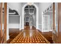 Grand foyer featuring decorative tile flooring, high ceilings, and architectural columns at 1350 Blackwell Rd, Marietta, GA 30066