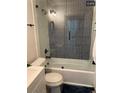 Stylish bathroom featuring patterned tile shower, modern fixtures, and glass door at 609 Spring St, Atlanta, GA 30354