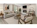 Stylishly furnished living room with a sleek fireplace and a modern sofa, creating an inviting atmosphere at 609 Spring St, Atlanta, GA 30354