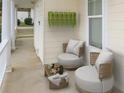 Cozy porch featuring comfortable seating, perfect for relaxing and enjoying the outdoors at 4811 Westgate Blvd, Atlanta, GA 30349