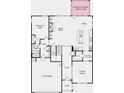 Open-concept first-floor plan features a kitchen, dining, and great room area plus a bedroom suite at 1455 Auburn Glen Rd, Dacula, GA 30019