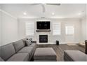 Cozy living room featuring fireplace and an attached wooden mantle at 3717 Silvery Way, Powder Springs, GA 30127