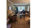 Inviting living room with a large window, piano, and comfortable seating area at 1910 Cooper Landing Se Dr, Smyrna, GA 30080