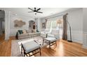 Bright living room with hardwood floors, neutral decor, and plenty of natural light at 2930 Ringle Rd, Brookhaven, GA 30341
