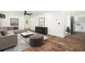 Modern living room features stylish furniture, wood floors and white walls at 2190 Highview Rd, Atlanta, GA 30311