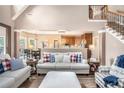 Comfortable living room open to the kitchen and dining area, perfect for Gathering gatherings and casual living at 90 Belleview Rdg, Sharpsburg, GA 30277
