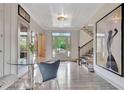 Bright foyer with hardwood floors, staircase and natural light at 5 Northlake Cir # 4 & 5, Peachtree City, GA 30269