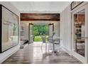 Inviting living room with French doors leading to backyard and garden views at 5 Northlake Cir # 4 & 5, Peachtree City, GA 30269