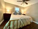 Cozy bedroom featuring a ceiling fan and warm lighting at 727 Channing Nw Dr, Atlanta, GA 30318
