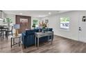 Open floor plan showcases a stylish living area that flows nicely with updated flooring and white paint, perfect for modern living at 2831 Ivanhoe Se Ln, Smyrna, GA 30082