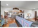 Inviting open-concept living room flowing into an updated kitchen at 605 Rocky Branch Rd, Villa Rica, GA 30180