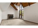 Bright living room with vaulted ceilings, stone fireplace, and large windows at 3450 Brookhill Cir, Marietta, GA 30062