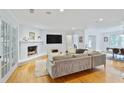 Inviting living room with hardwood floors and a decorative fireplace at 4554 Meadow Valley Dr, Atlanta, GA 30342