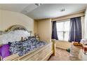 Bedroom with large window, allowing natural light at 2325 Thackery Rd, Snellville, GA 30078